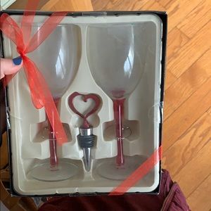 Wine glasses with heart shaped opener